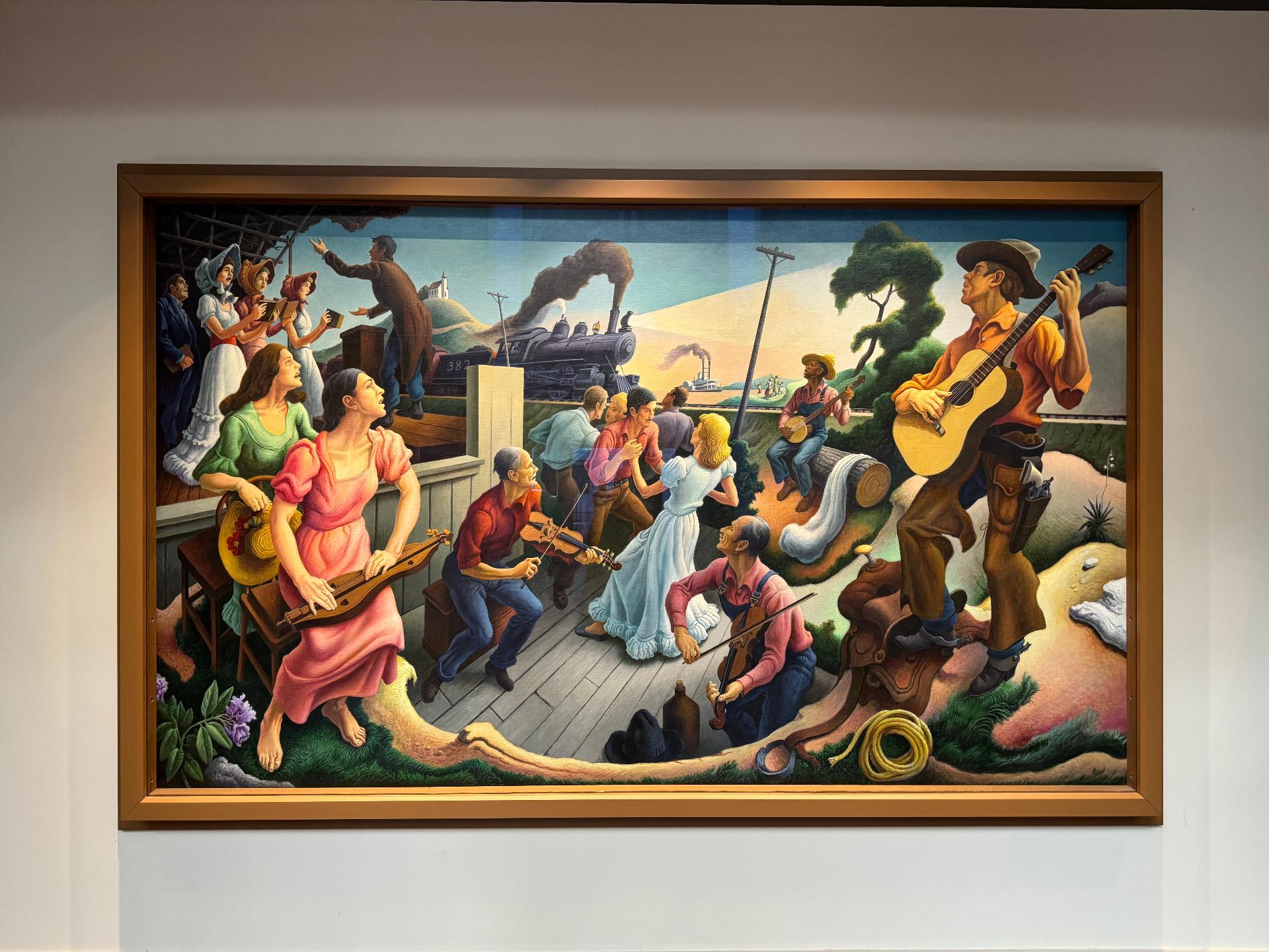 Pintura enmarcada de músicos y bailarines