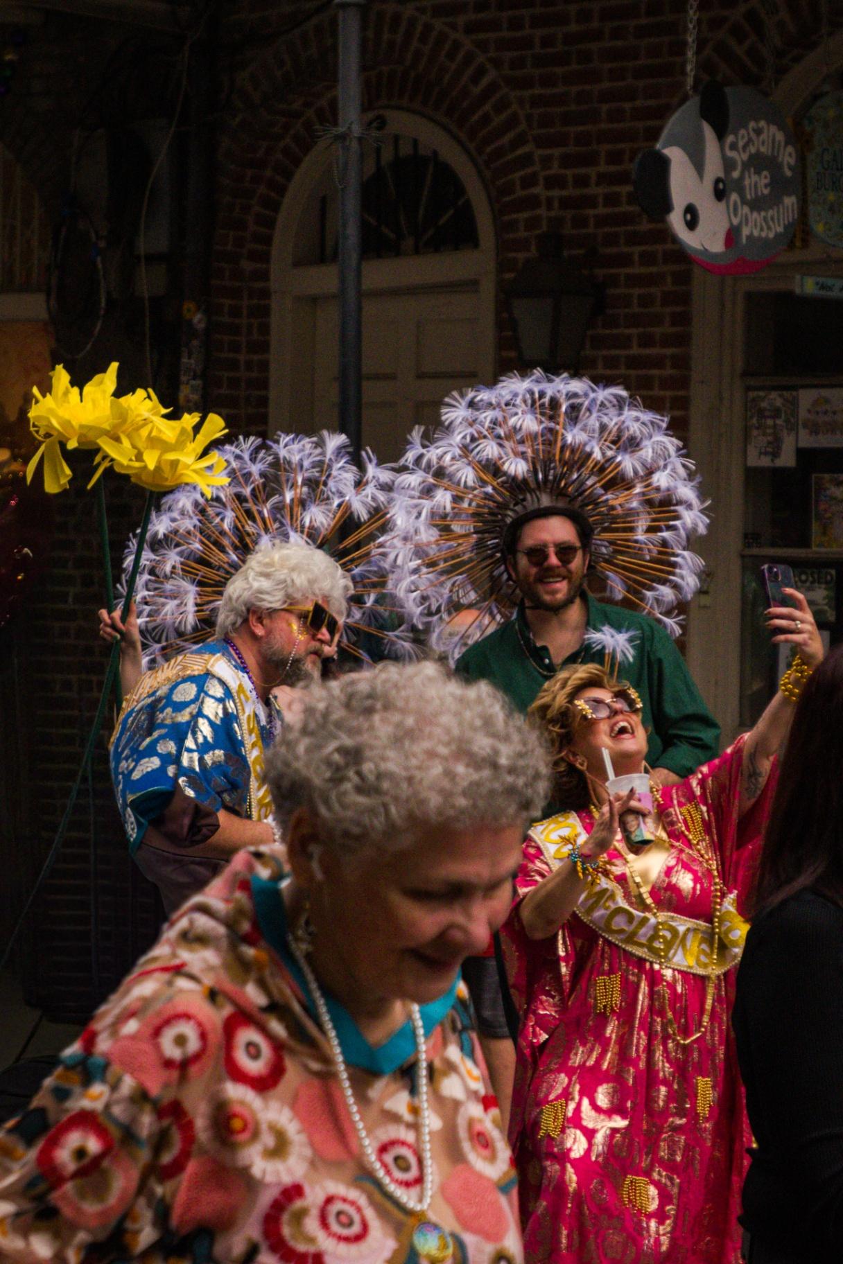 Krewe members with elaborate headdresses