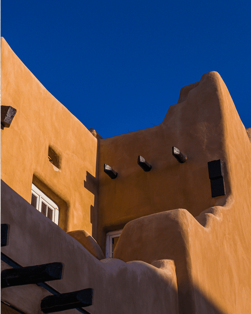 Adobe architecture against blue sky